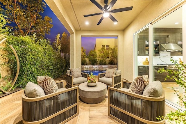 view of patio / terrace featuring ceiling fan and outdoor lounge area