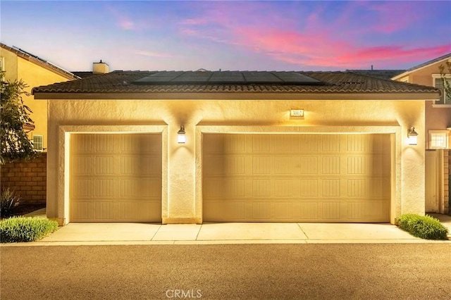 garage with solar panels