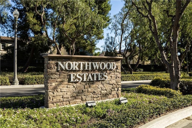 view of community sign