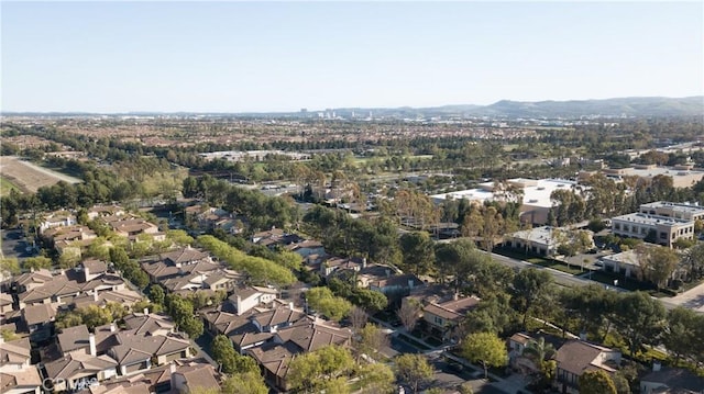 aerial view of property's location featuring nearby suburban area