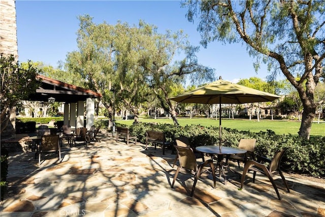 view of patio with outdoor dining area