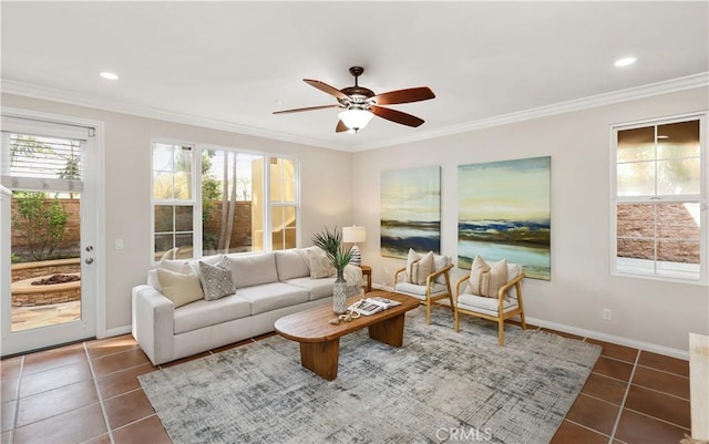 living area with ceiling fan, dark tile patterned floors, crown molding, baseboards, and recessed lighting