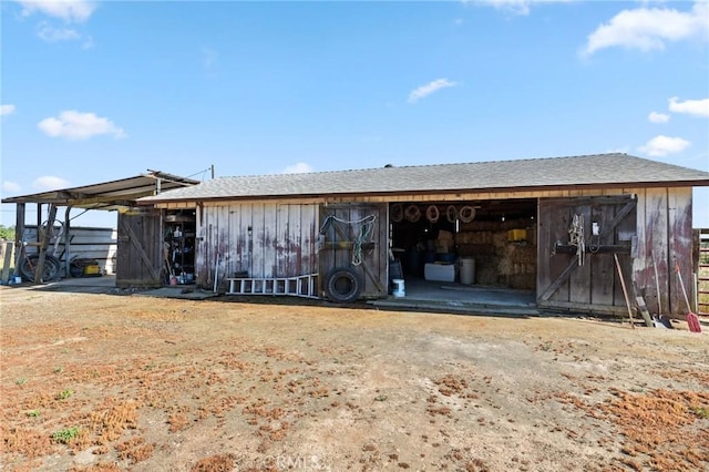 exterior space featuring an outdoor structure