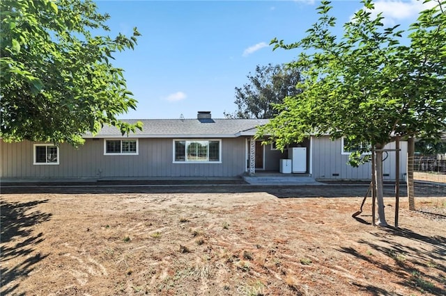 view of front of property with a chimney