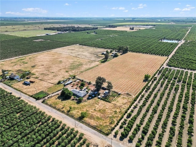 birds eye view of property featuring a rural view