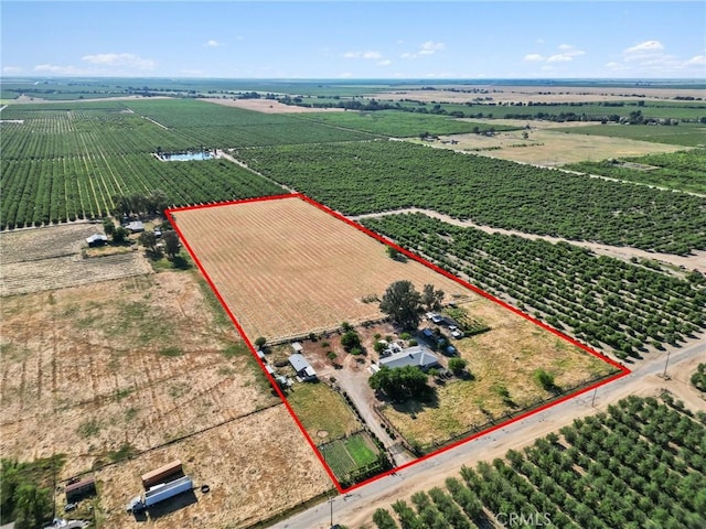 birds eye view of property featuring a rural view