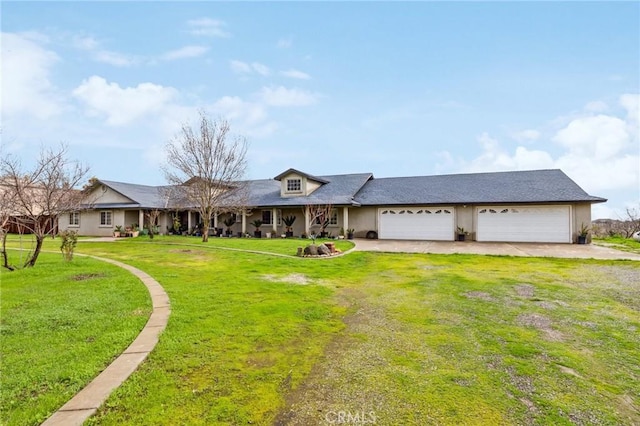 ranch-style house featuring driveway, an attached garage, and a front yard