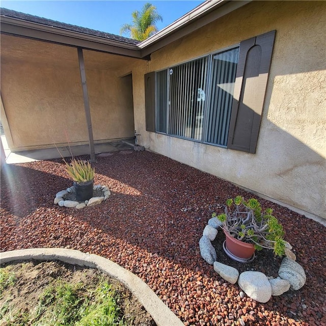 view of property exterior with stucco siding