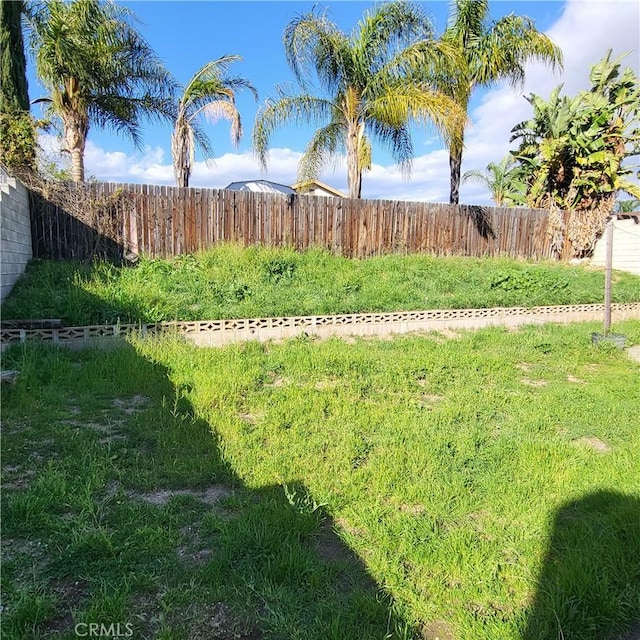 view of yard with fence