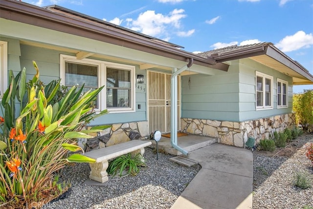 property entrance with a porch