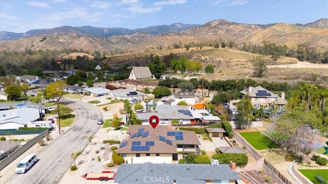 bird's eye view featuring a residential view and a mountain view