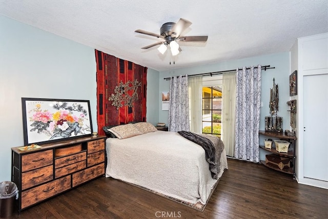 bedroom with access to exterior, ceiling fan, a textured ceiling, and wood finished floors