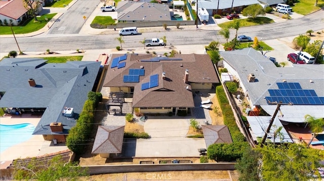 birds eye view of property with a residential view