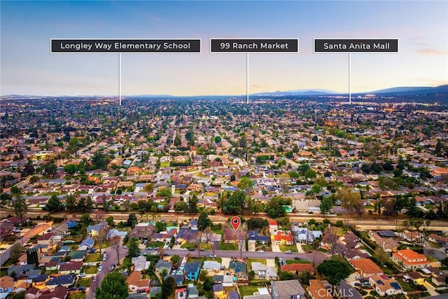 aerial view at dusk with a residential view