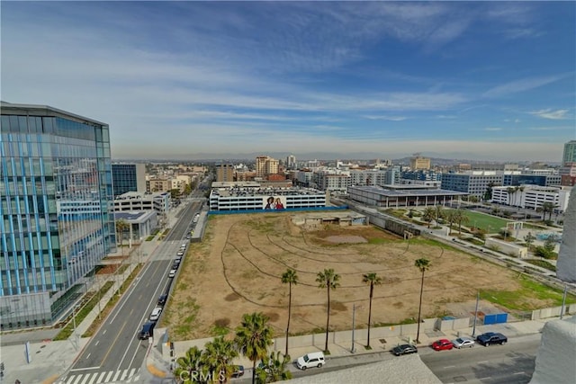 birds eye view of property featuring a city view