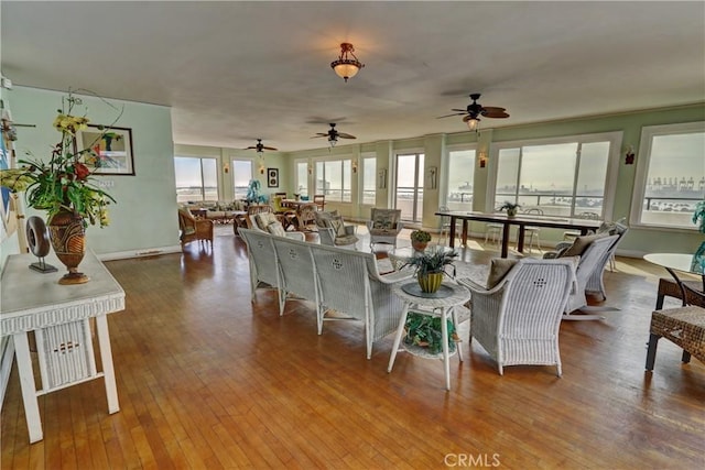 360 W Ocean Blvd Unit 404, Long Beach, CA 90802 - living area with ceiling fan and hardwood / wood-style floors