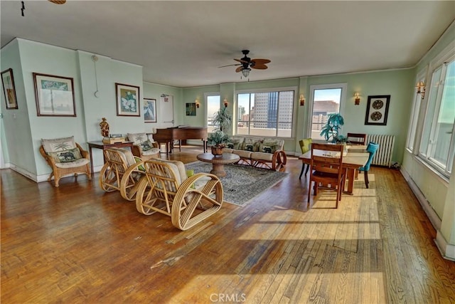360 W Ocean Blvd Unit 404, Long Beach, CA 90802 - living area with hardwood / wood-style floors, plenty of natural light, ceiling fan, and radiator