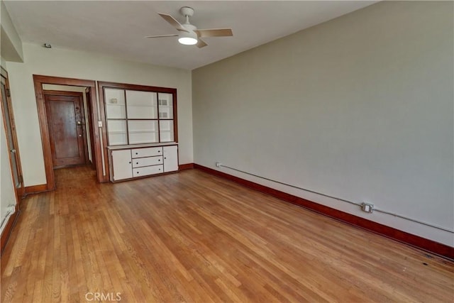 360 W Ocean Blvd Unit 404, Long Beach, CA 90802 - empty room featuring ceiling fan and wood finished floors