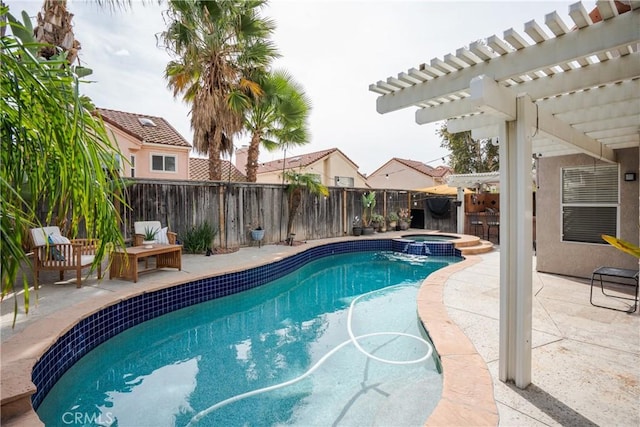 view of swimming pool with a patio area, a fenced backyard, a pool with connected hot tub, and a pergola