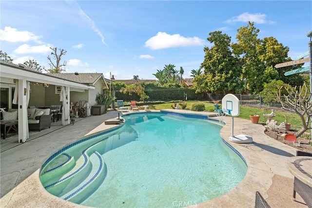 view of pool with a patio area, a fenced backyard, an outdoor living space, and a fenced in pool