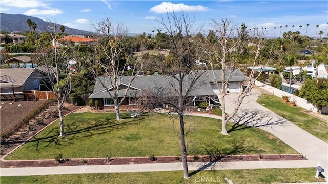 birds eye view of property featuring a residential view and a mountain view