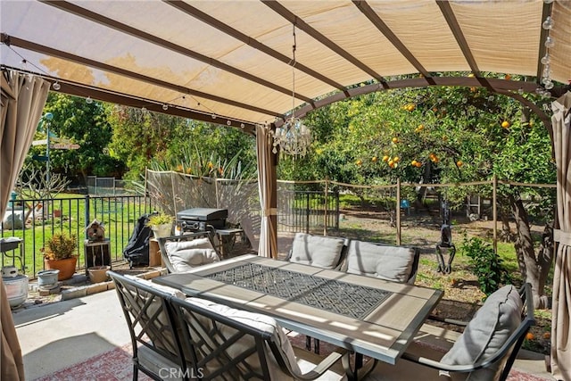 view of patio / terrace with outdoor dining space, grilling area, a fenced backyard, and a pergola