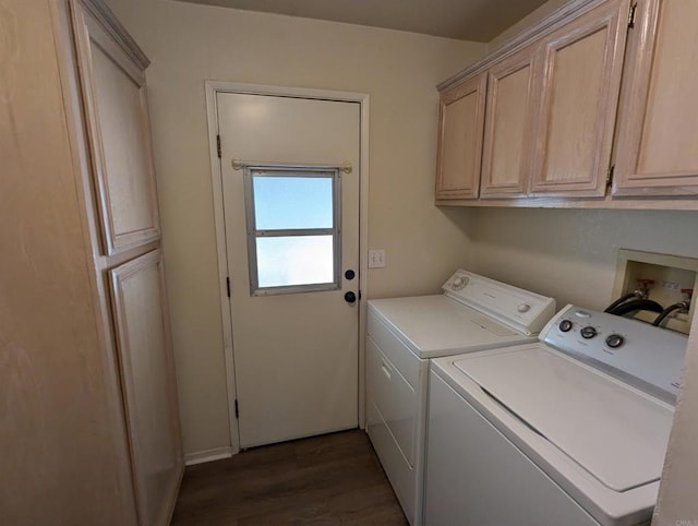 laundry room featuring dark wood-type flooring, cabinet space, and independent washer and dryer