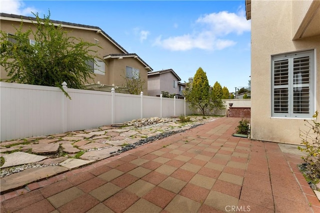 view of patio featuring a fenced backyard