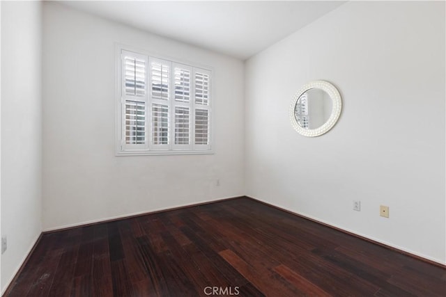 empty room featuring hardwood / wood-style floors