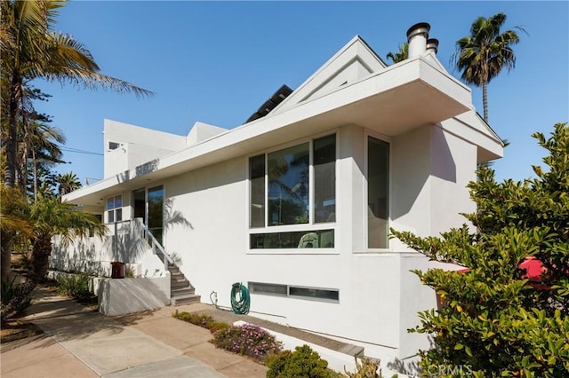 exterior space featuring stucco siding