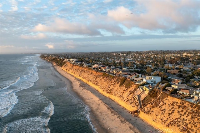 aerial view featuring a beach view and a water view