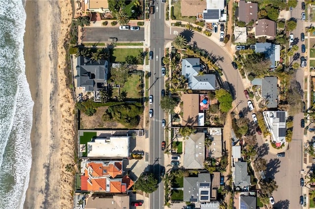 bird's eye view featuring a residential view and a water view