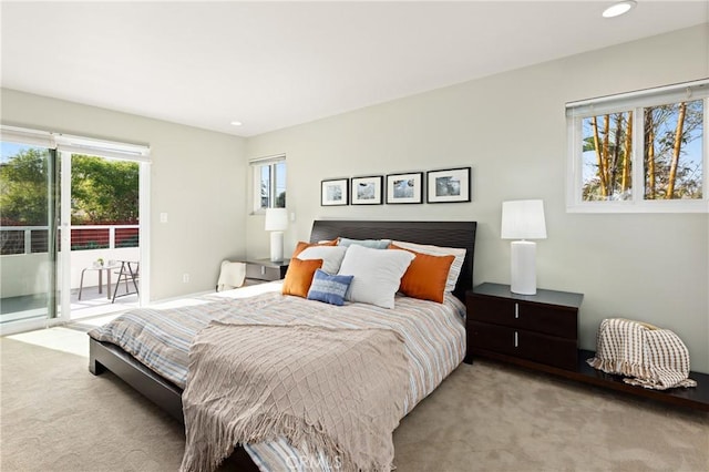 bedroom with access to outside, carpet flooring, and recessed lighting