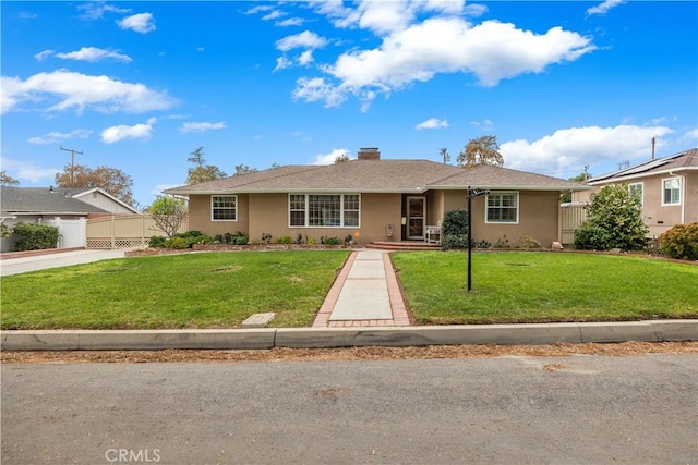 ranch-style home with stucco siding, a chimney, fence, and a front yard