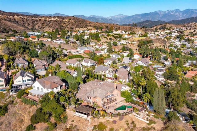 aerial view with a residential view and a mountain view