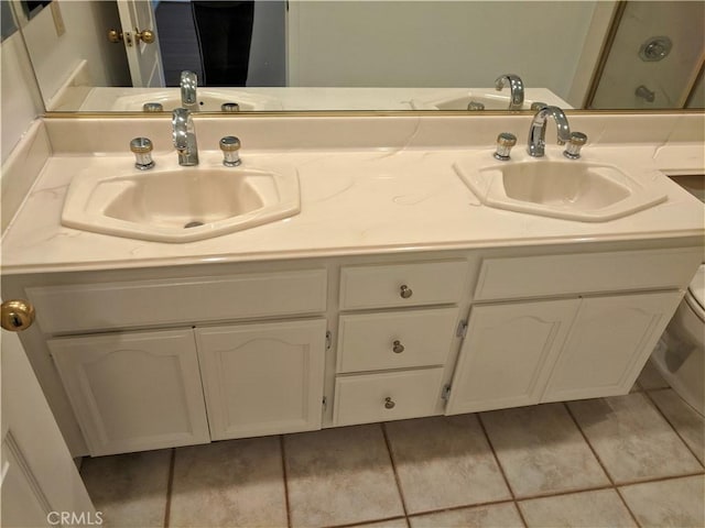 bathroom with double vanity and a sink