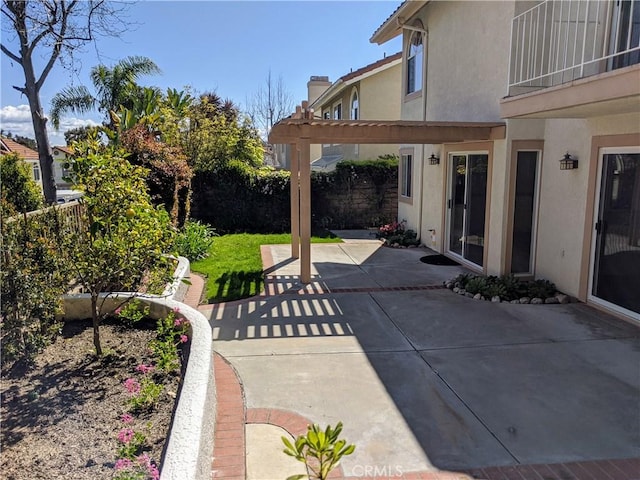 view of patio / terrace featuring a fenced backyard and a pergola