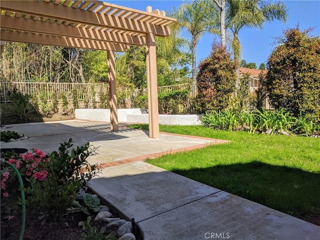 exterior space featuring fence, a patio, and a pergola