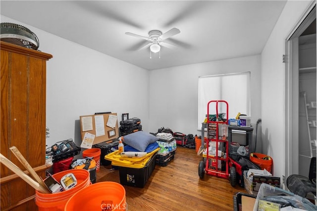 playroom with ceiling fan and wood finished floors