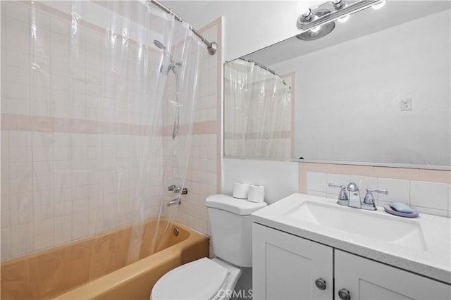 bathroom with shower / tub combo, vanity, toilet, and decorative backsplash