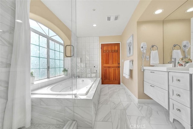 full bath with marble finish floor, visible vents, vanity, baseboards, and a bath