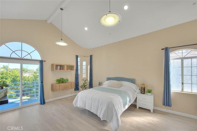 bedroom with high vaulted ceiling, beamed ceiling, baseboards, and wood finished floors