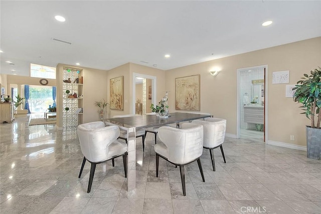 dining area featuring baseboards, visible vents, and recessed lighting