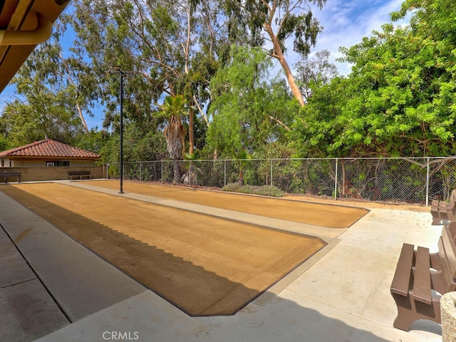 27740 Via Sarasate, Mission Viejo, CA 92692 - surrounding community featuring a patio area and view of wooded area
