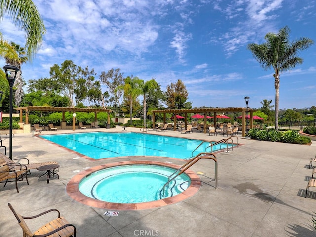 27740 Via Sarasate, Mission Viejo, CA 92692 - community pool featuring a pergola, a hot tub, and a patio