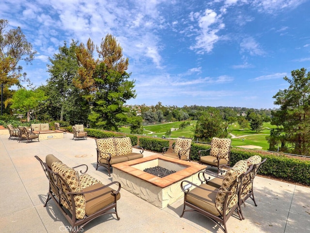 27740 Via Sarasate, Mission Viejo, CA 92692 - view of patio with an outdoor living space with a fire pit, golf course view, and view of wooded area