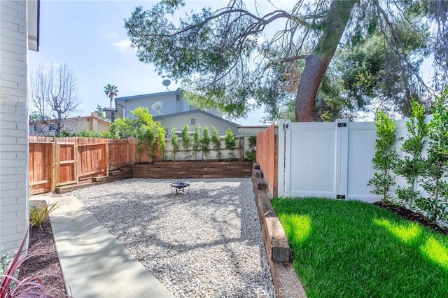 exterior space with a fenced backyard and a patio