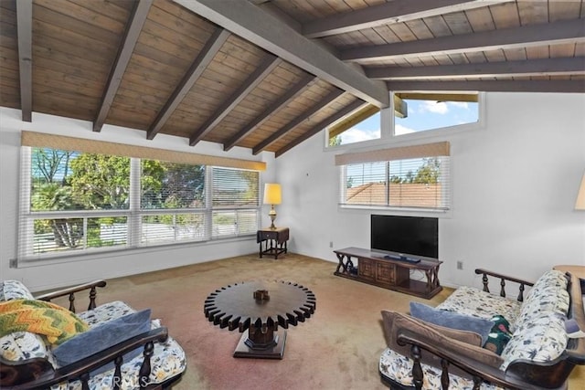 carpeted living room with wooden ceiling, a healthy amount of sunlight, and vaulted ceiling with beams