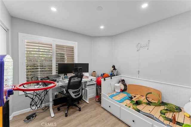 home office with recessed lighting and wood finished floors