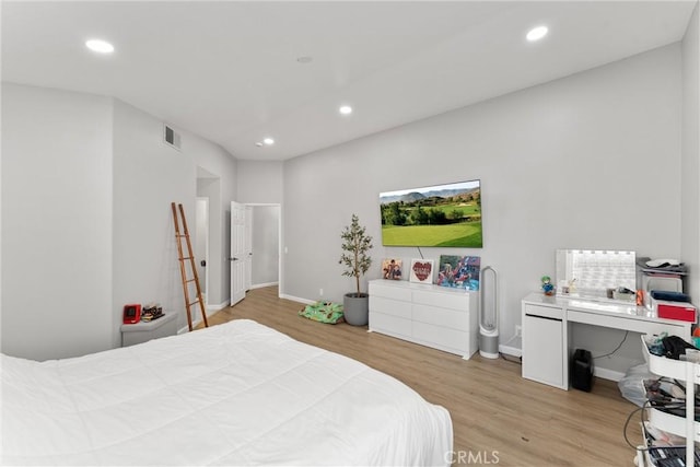 bedroom with baseboards, recessed lighting, visible vents, and light wood-type flooring